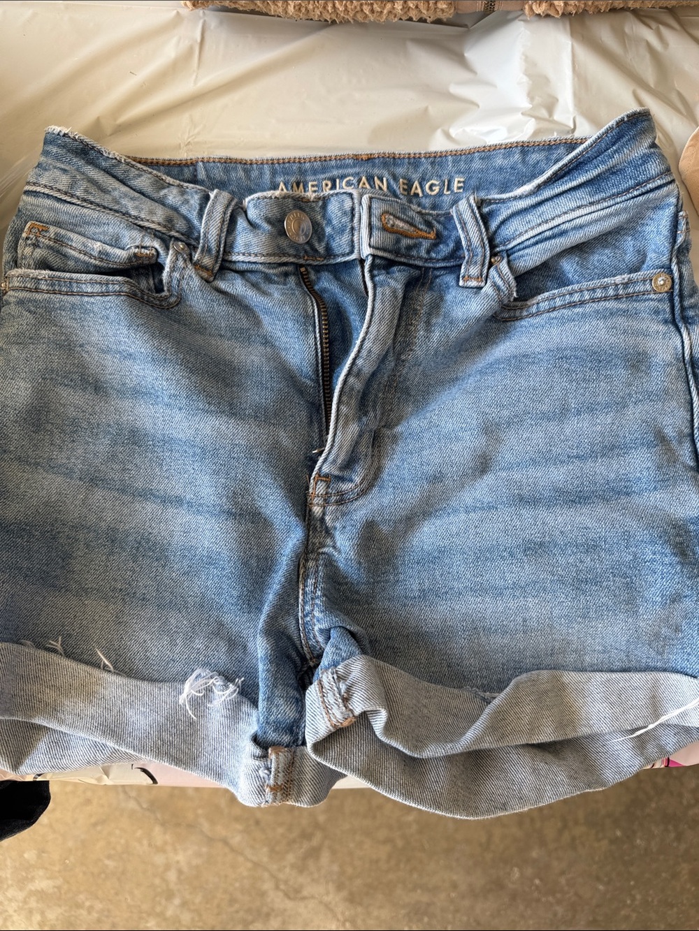 American Eagle Outfitters Light Wash Denim Rolled-Hem Shorts